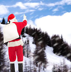 Image showing man in costume of santa claus with bag