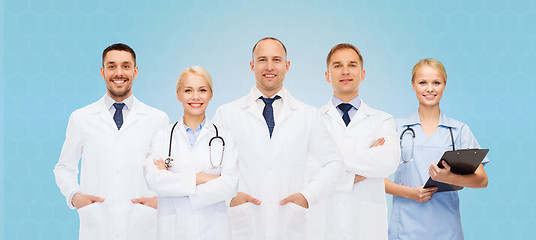 Image showing group of doctors with stethoscopes and clipboard