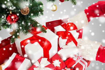 Image showing close up of santa claus with presents