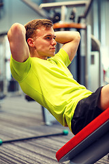 Image showing man exercising in gym