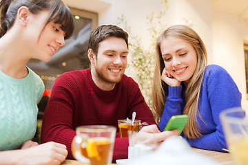 Image showing group of friends with smartphone meeting at cafe