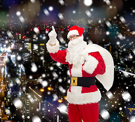 Image showing man in costume of santa claus with bag