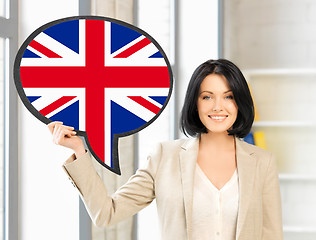 Image showing smiling woman with text bubble of british flag