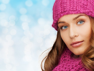 Image showing close up of smiling young woman in winter clothes