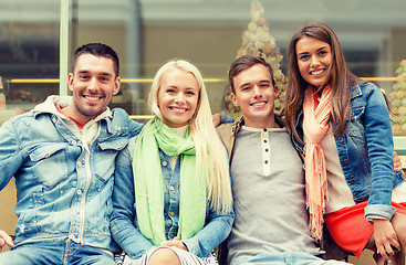 Image showing group of smiling friends in city