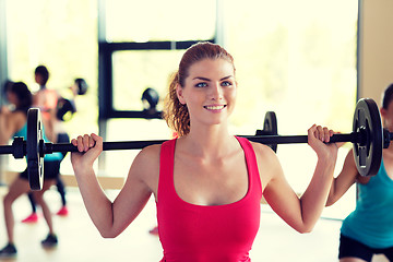 Image showing group of women with barbells in gym