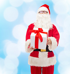 Image showing man in costume of santa claus with gift box