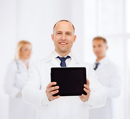 Image showing smiling male doctor with tablet pc