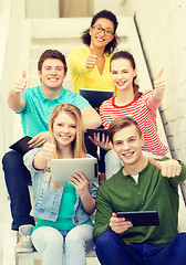 Image showing smiling students with tablet pc computer