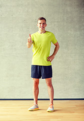 Image showing smiling man in gym