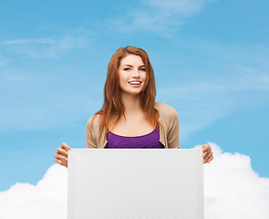 Image showing smiling teenage with white board