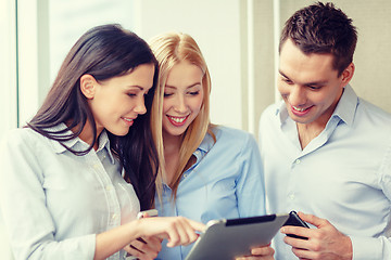 Image showing business team working with tablet pcs in office