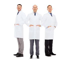 Image showing smiling male doctors in white coats