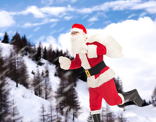 Image showing man in costume of santa claus with bag