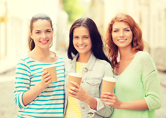 Image showing smiling teenage girls with on street