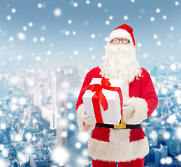 Image showing man in costume of santa claus with gift box