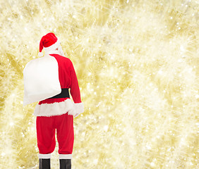 Image showing man in costume of santa claus with bag