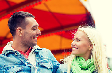 Image showing smiling couple in amusement park