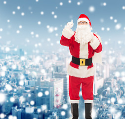 Image showing man in costume of santa claus with bag