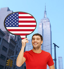 Image showing smiling man with text bubble of american flag