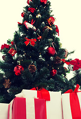 Image showing close up of christmas tree and presents