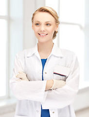 Image showing smiling young female doctor in hospital