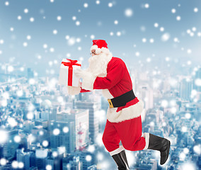 Image showing man in costume of santa claus with gift box