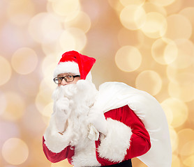 Image showing man in costume of santa claus with bag