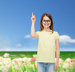 Image showing smiling cute little girl in black eyeglasses