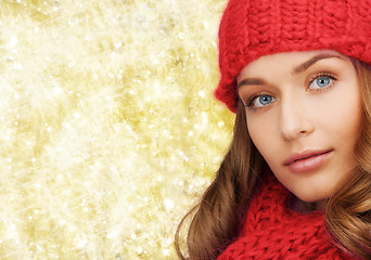 Image showing close up of smiling young woman in winter clothes