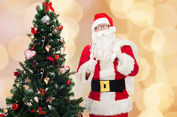 Image showing santa claus with bag and christmas tree