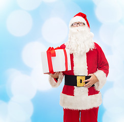 Image showing man in costume of santa claus with gift box