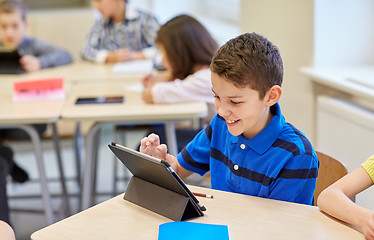 Image showing school kids with tablet pc in classroom