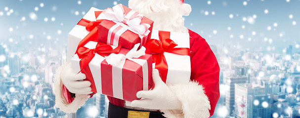 Image showing close up of santa claus with gift box