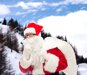 Image showing man in costume of santa claus with bag