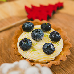 Image showing Traditional Christmas cake. Warm colors.