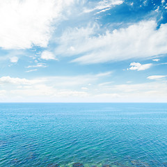 Image showing clouds in blue sky over sea