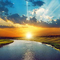 Image showing good sunset in clouds and river