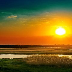 Image showing dramatic sunset over river