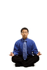 Image showing Meditating businessman