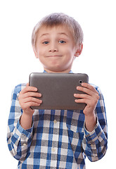 Image showing Boy with tablet on a white background