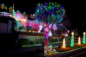 Image showing Christmas Lights Decorations on suburban house for charity