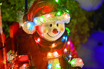 Image showing Christmas figurine toy dressed in santa costume with led lights