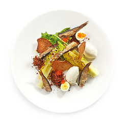 Image showing plate of salad with sprats and sour cream