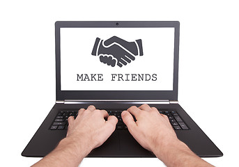 Image showing Man working on laptop, make friends