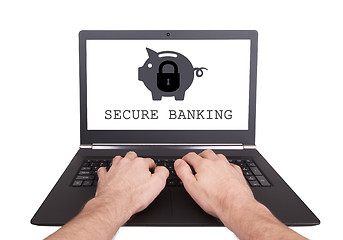 Image showing Man working on laptop, secure banking