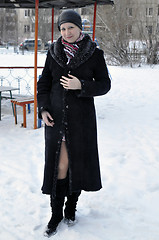 Image showing Portrait of the young beautiful woman in the winter on the stree