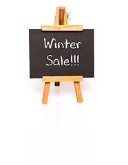 Image showing Winter Sale. Blackboard with text and easel.