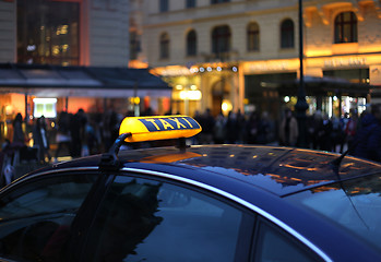 Image showing Taxi sign at night 