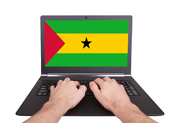 Image showing Hands working on laptop, Sao Tome and Principe